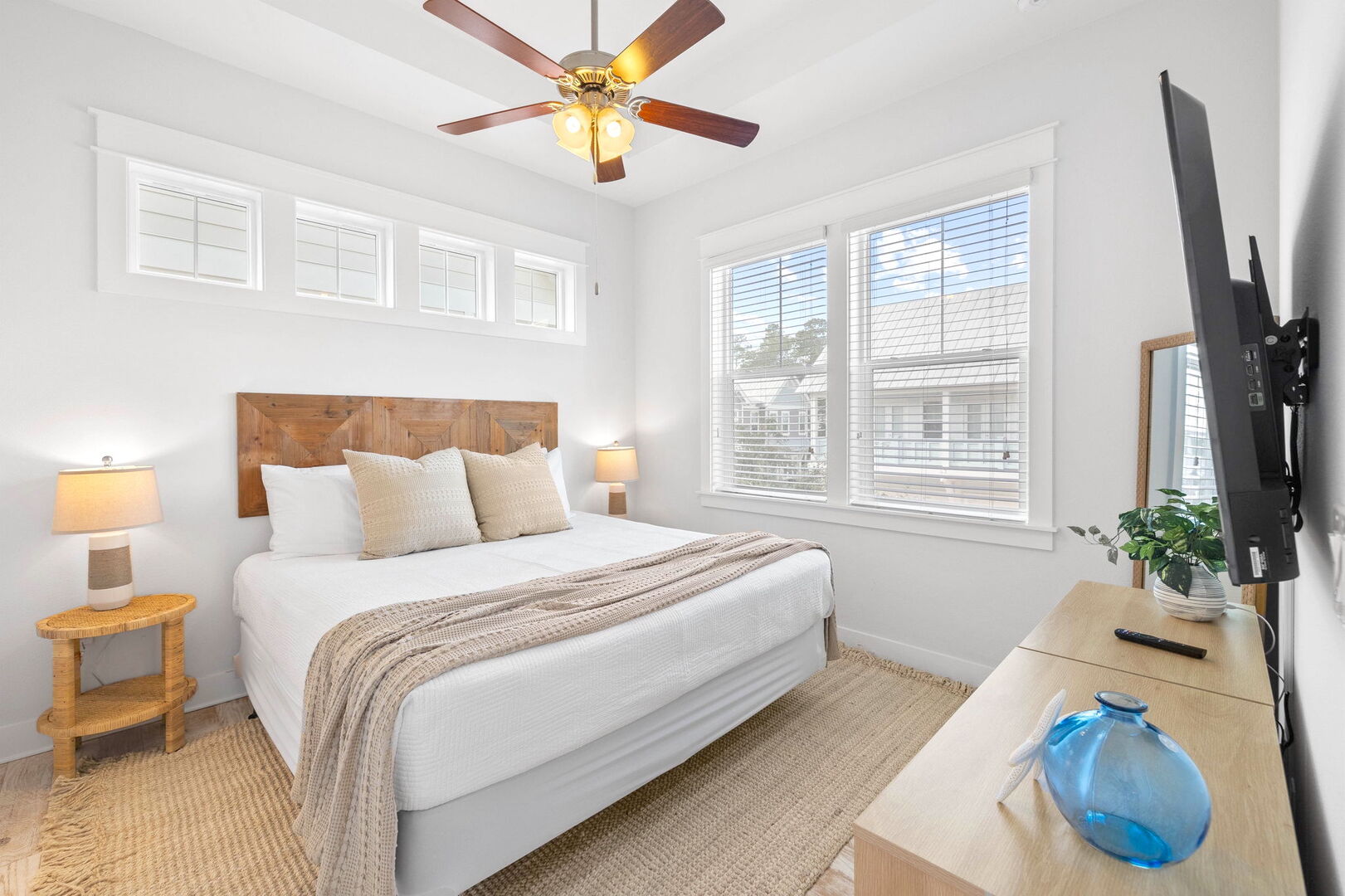 Primary bedroom features a king bed.