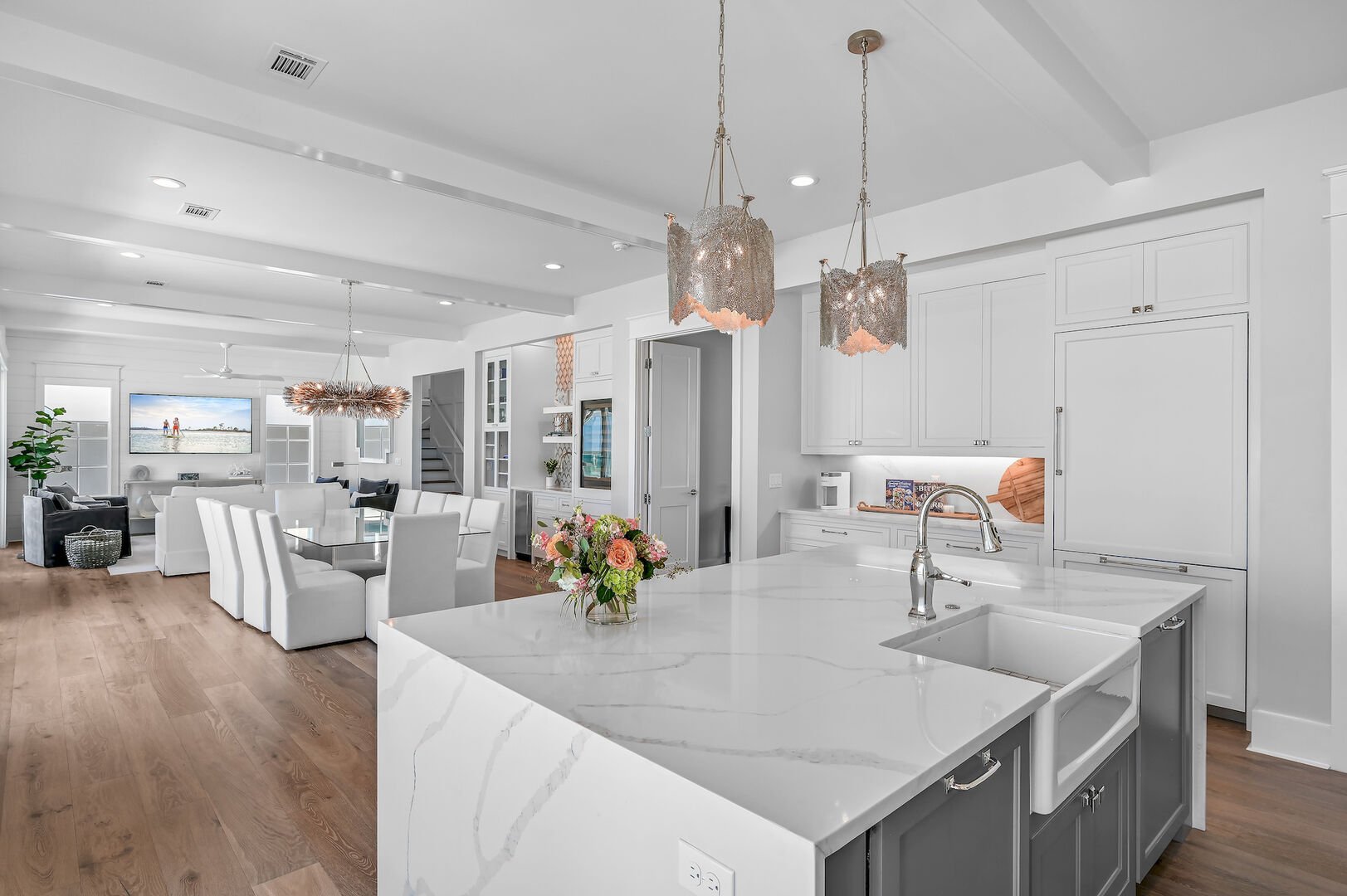 Large marble waterfall kitchen island perfect for cooking meals or inviting a private chef!