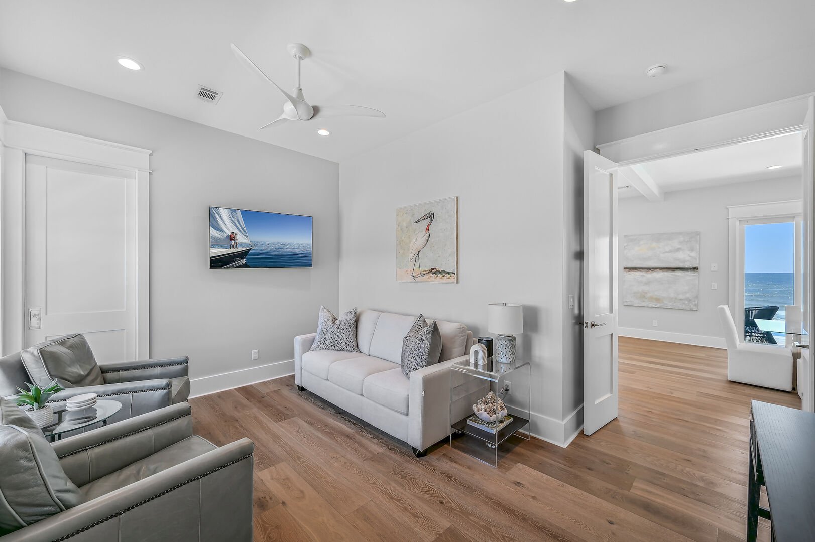 Sitting area off the kitchen space provides a queen sleeper sofa.