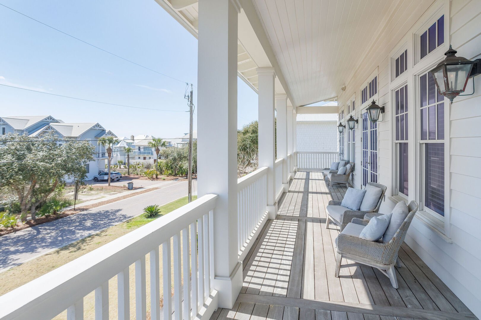 Large balcony space across the second floor of the home with plenty of seating!