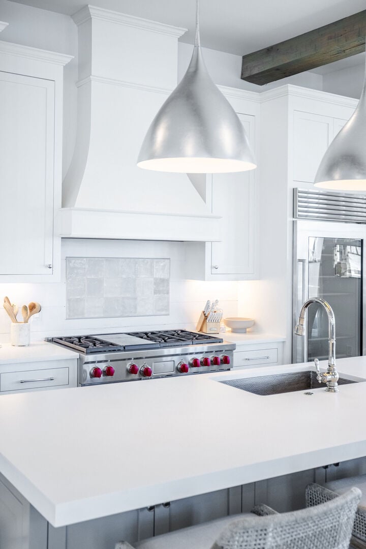 Wolfe stove in kitchen.