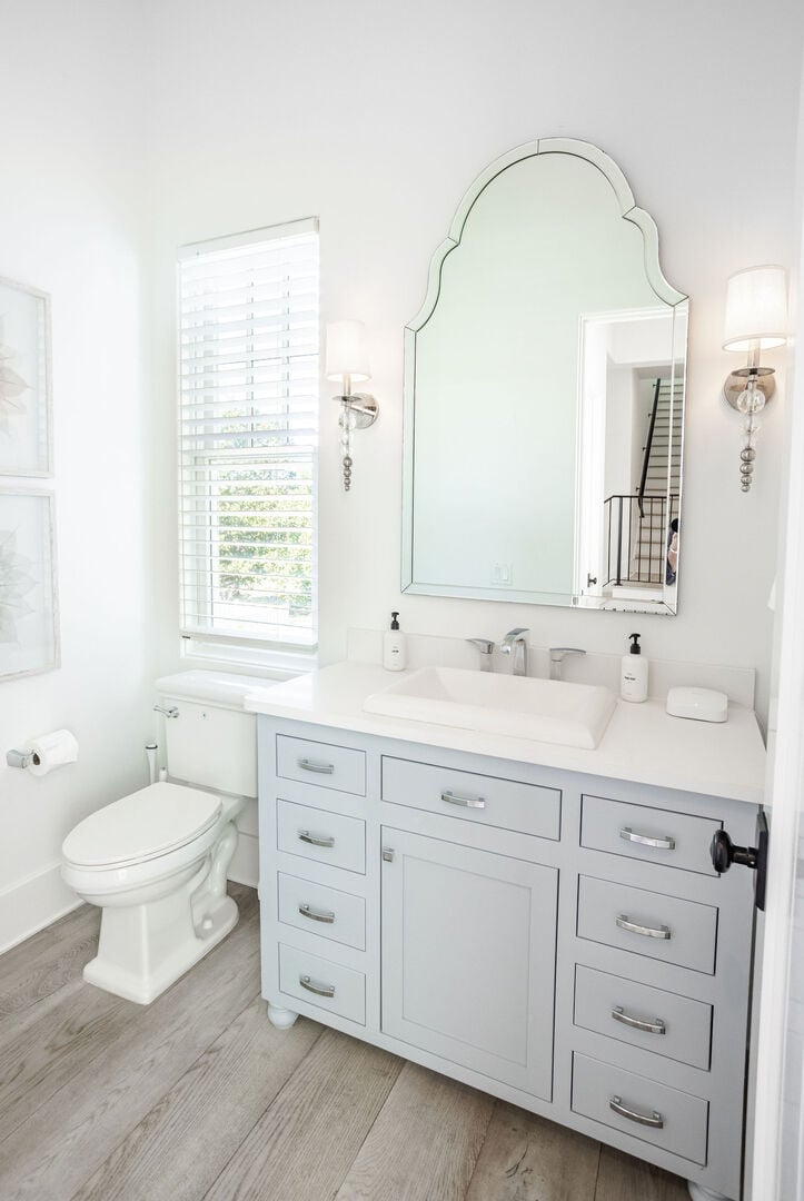 Half bathroom off living room area.