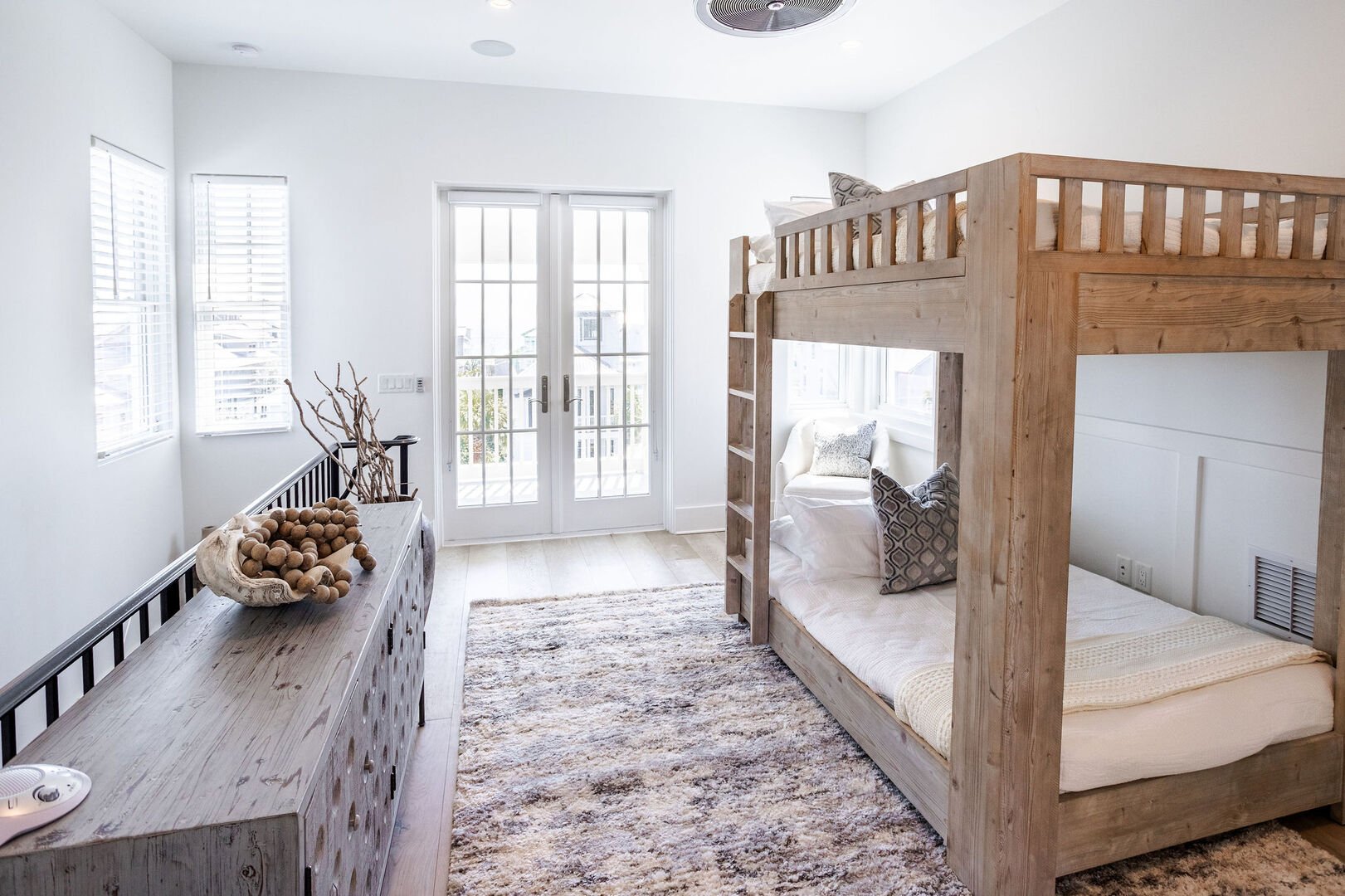 Step outside the third floor loft area to a beautiful patio space with sweeping Gulf views!