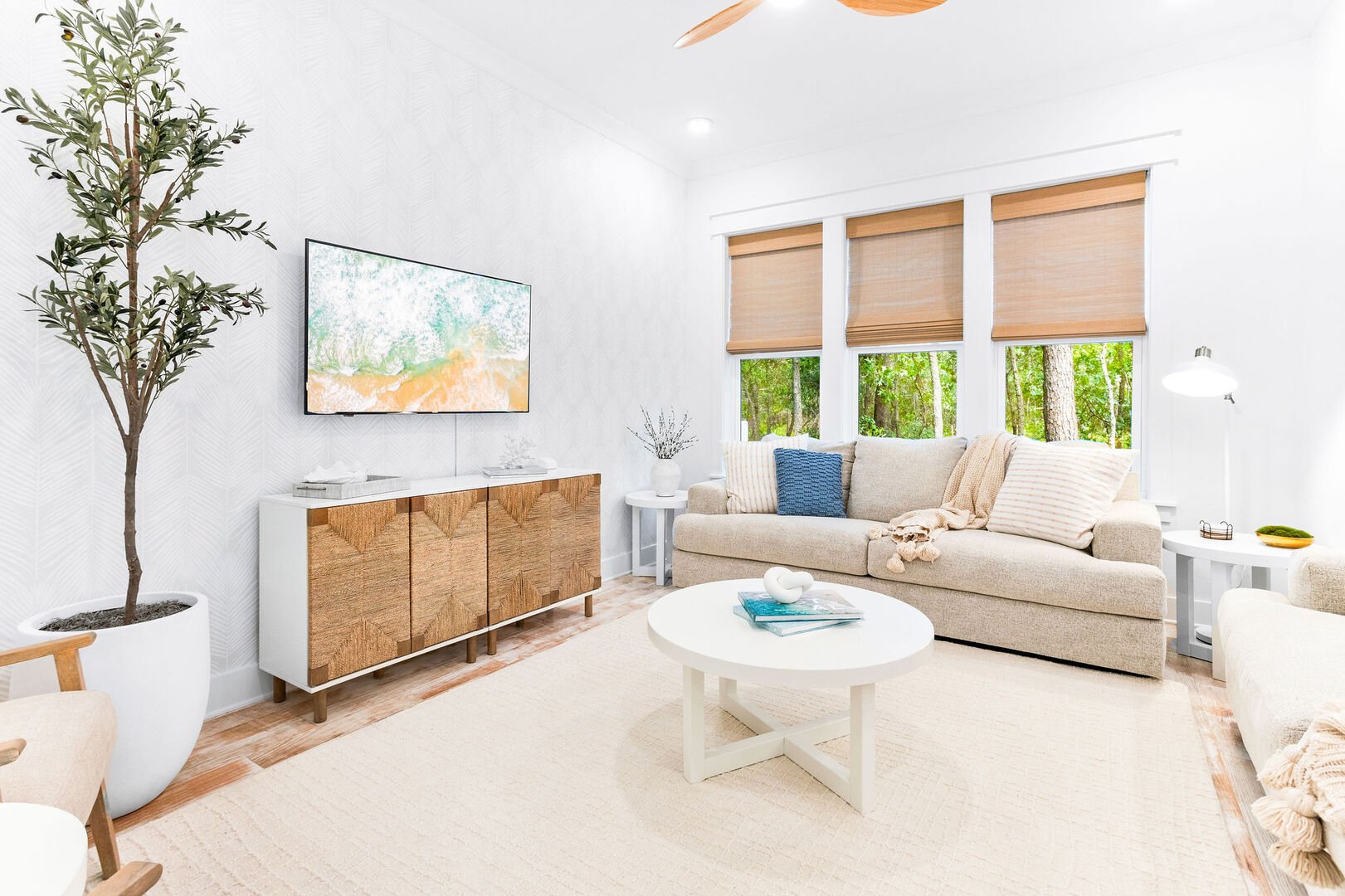 Large living room with plenty of seating for watching movies!