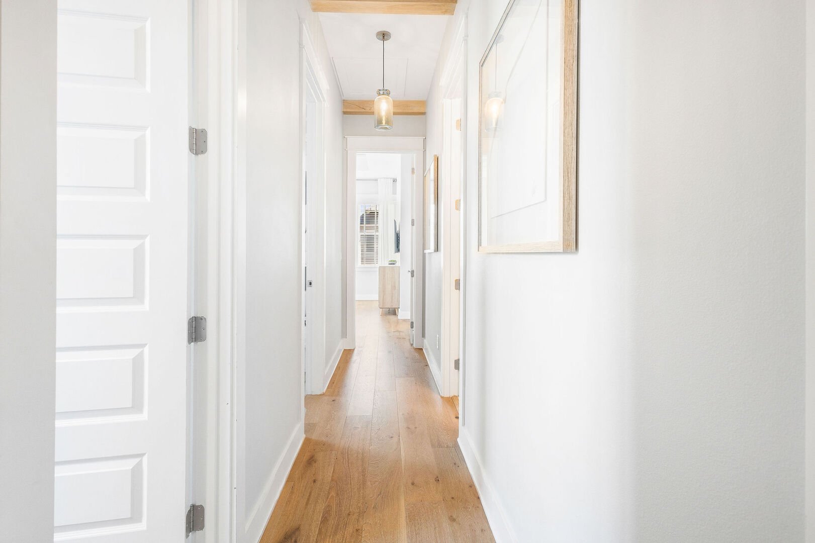 Second floor hallway leads to bedrooms.
