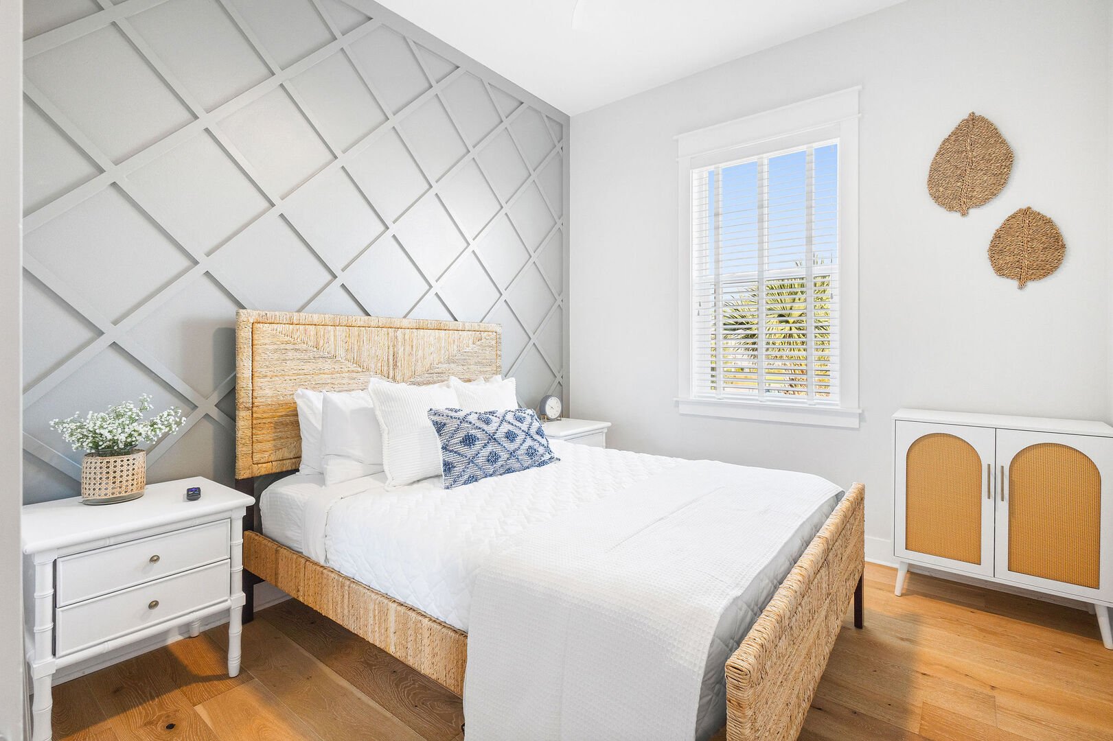 Bedroom #1 features a queen bed and smart tv.