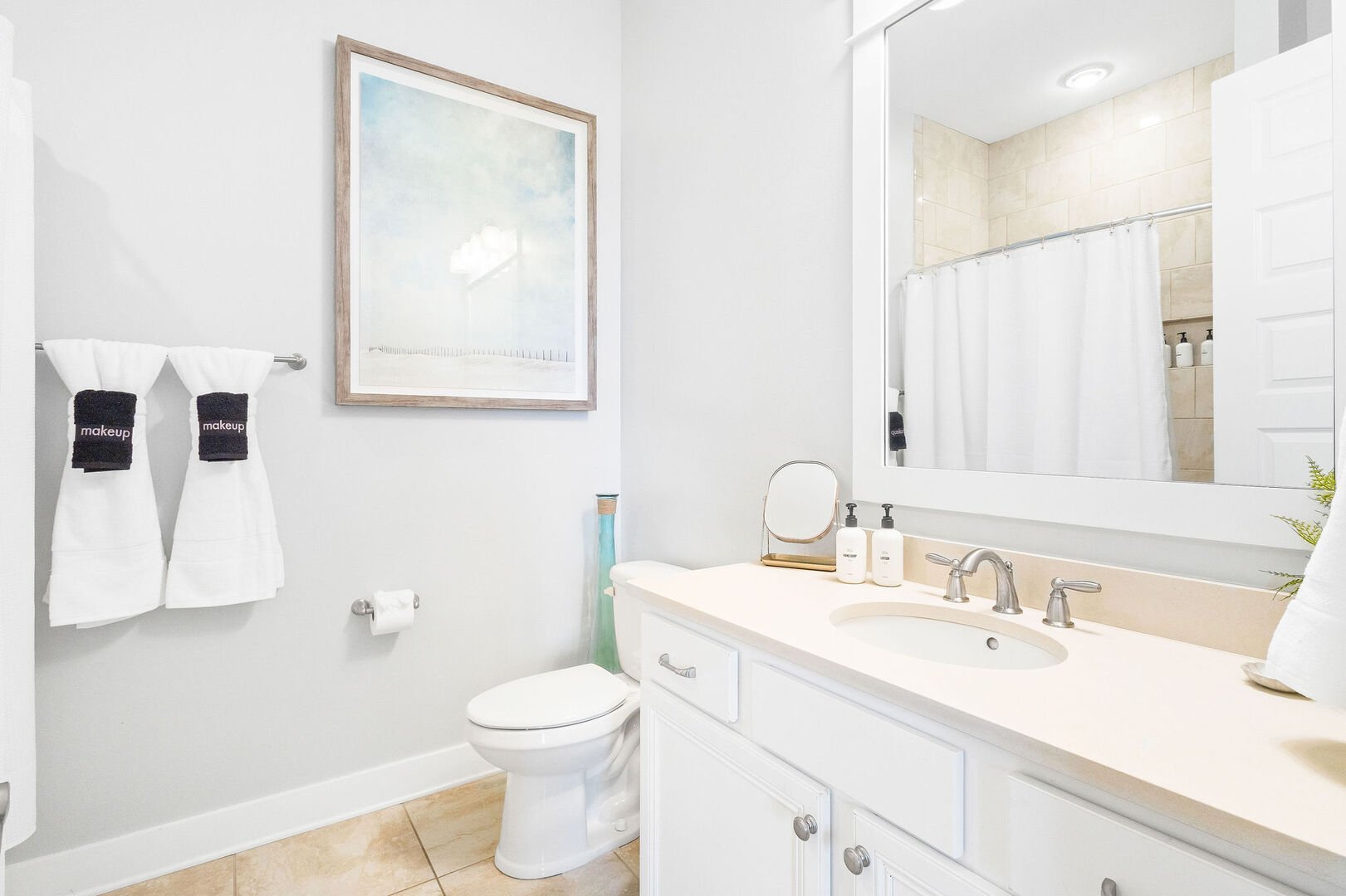 Second floor hallway bathroom features a tub/shower combo.
