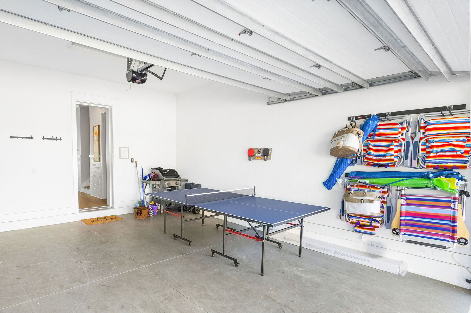 Garage is stocked with beach gear and a ping pong table for some friendly competition!