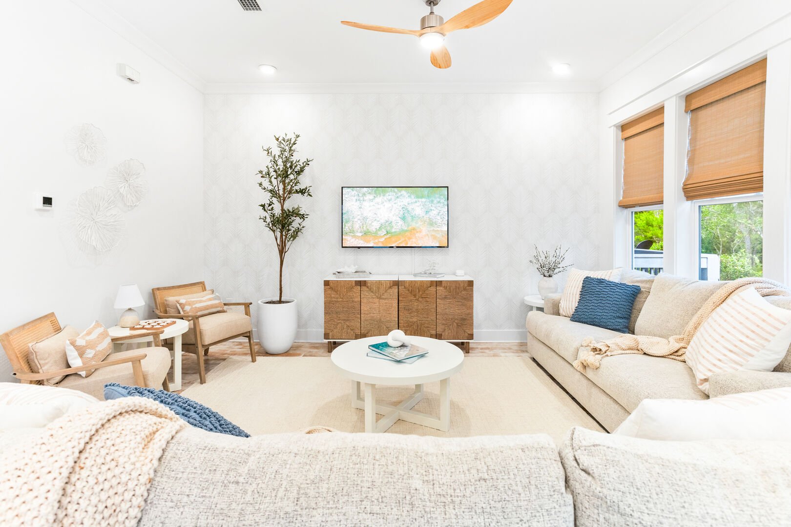 Living room space has a smart tv.