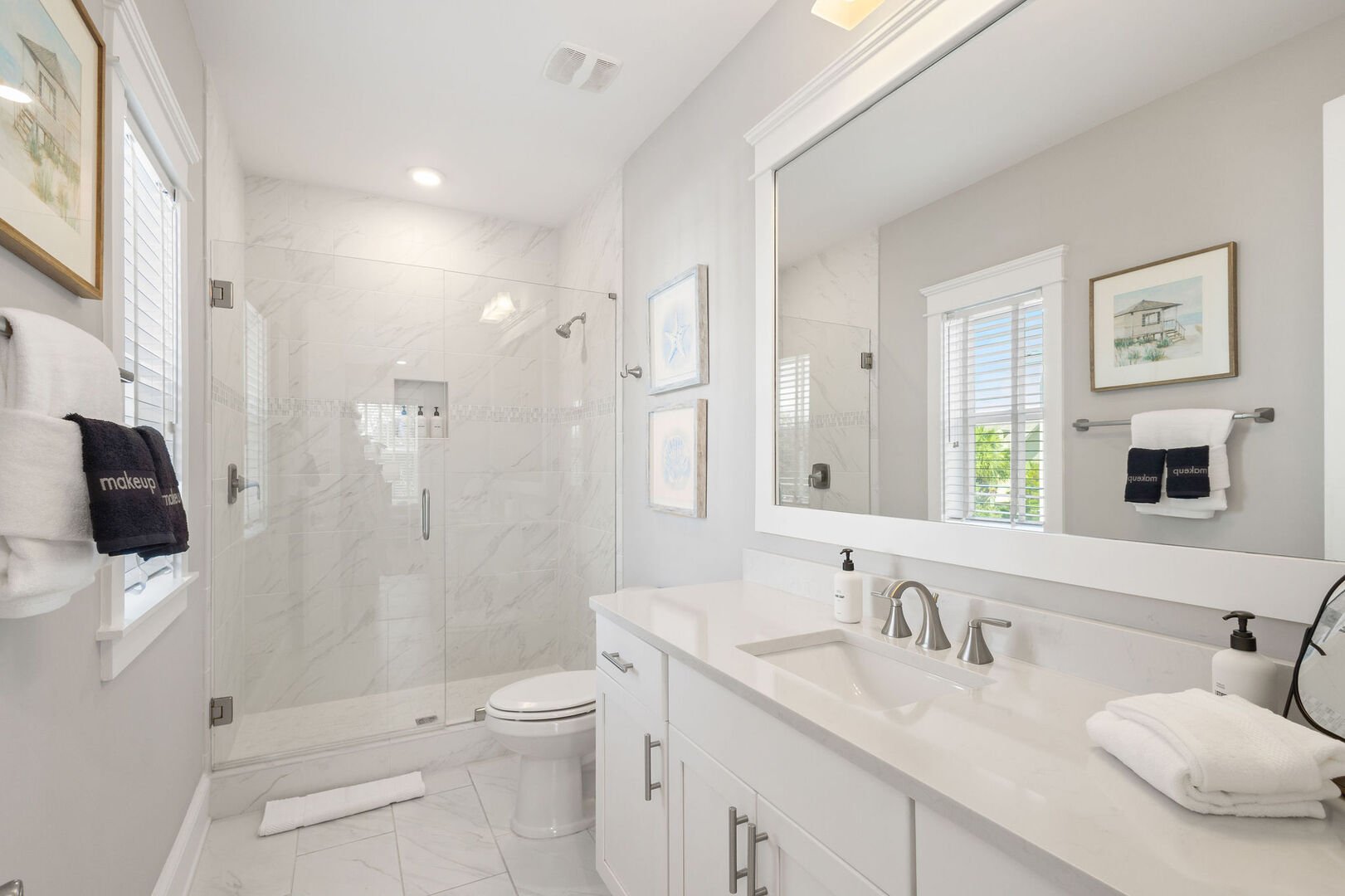 Bathroom features a walk-in shower.