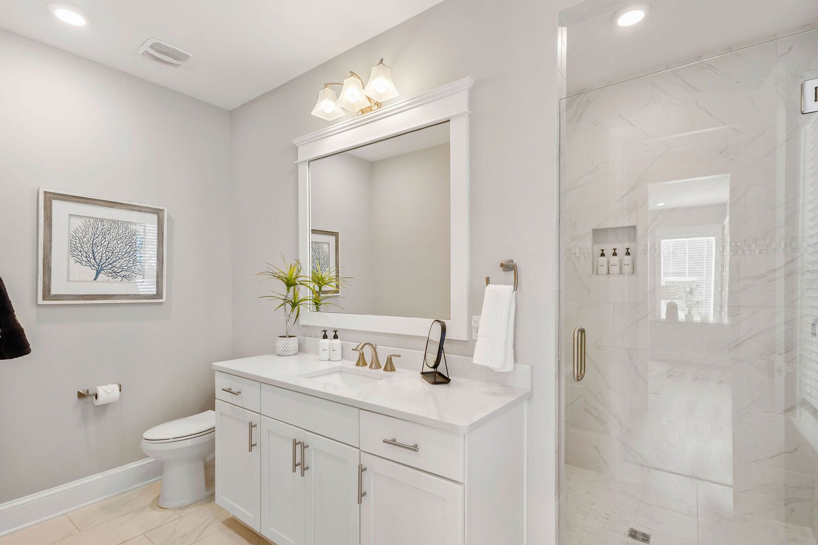 Bathroom features a walk-in shower