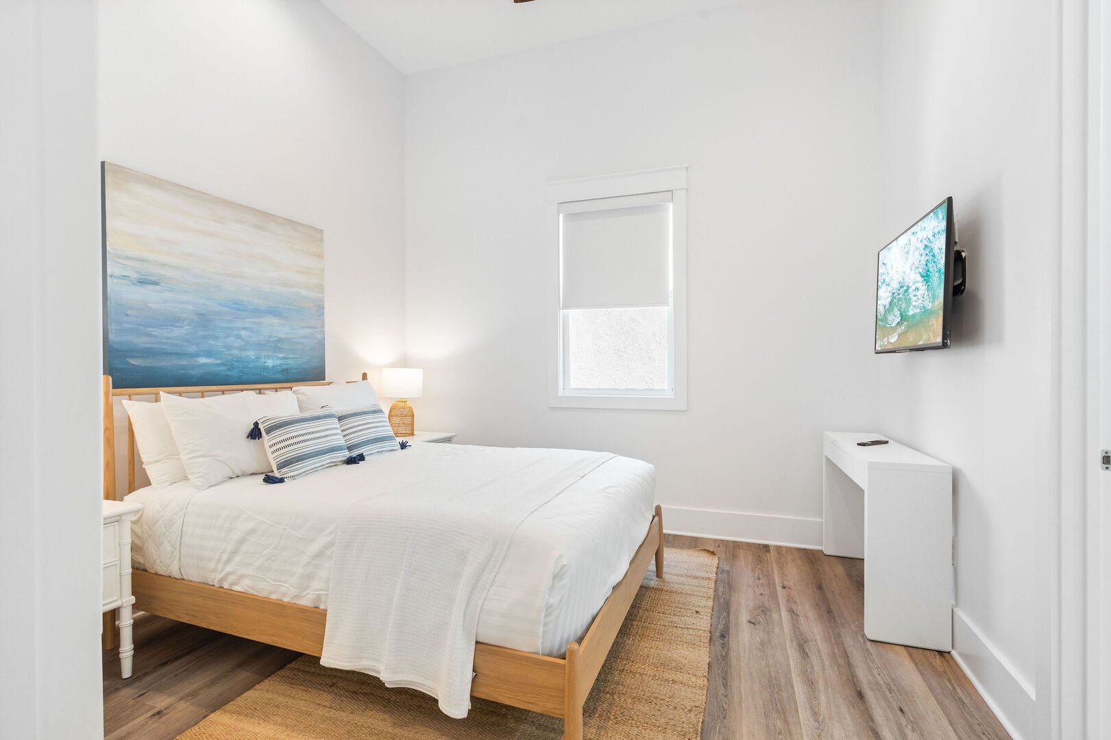 Bedroom #1 features a queen bed, smart tv and ensuite.