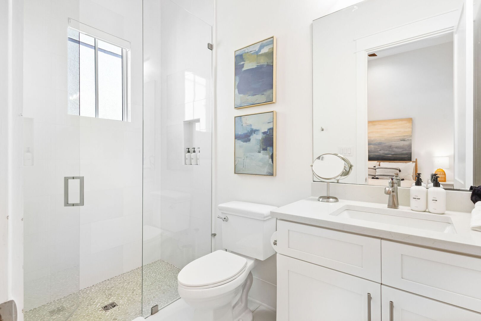 Bathroom features a walk-in shower.