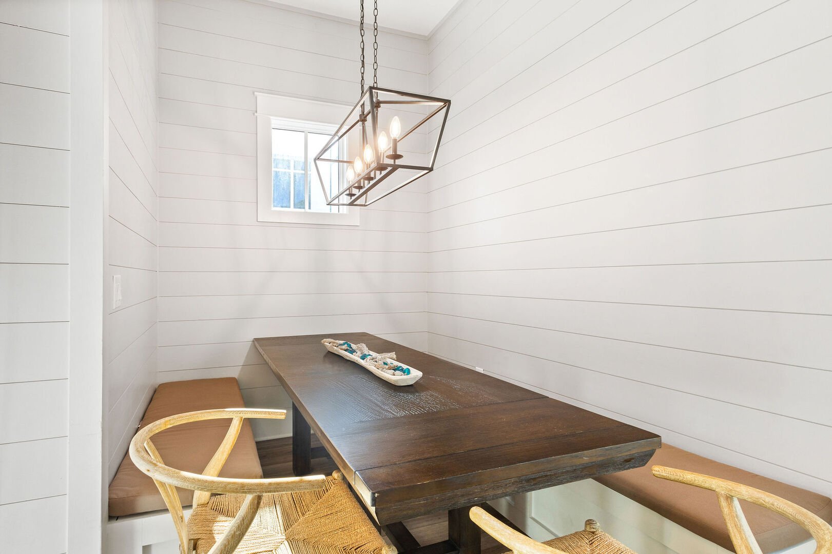 Gather around the built in dining nook.