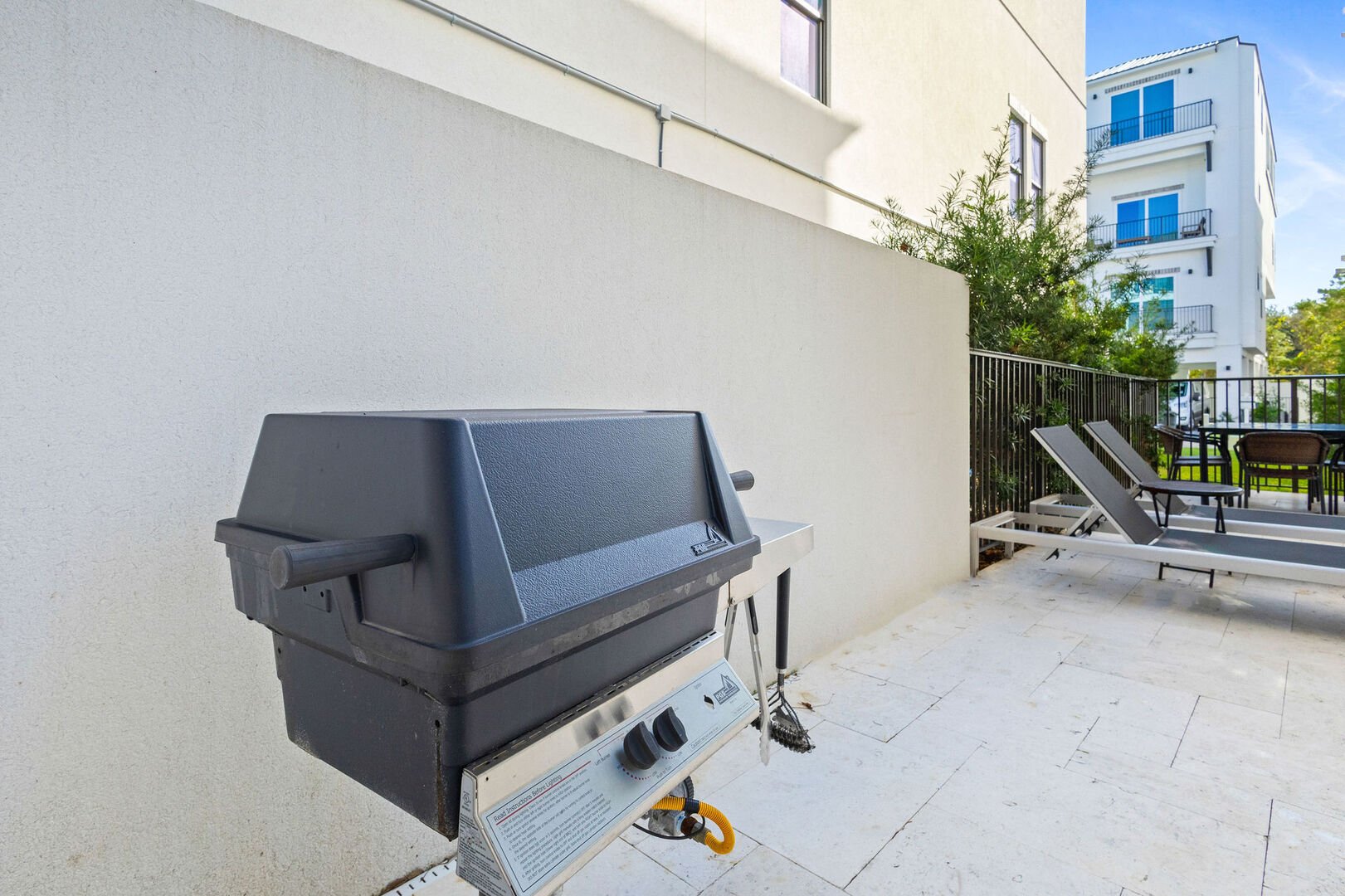 Enjoy the natural gas grill for a cookout by the pool!