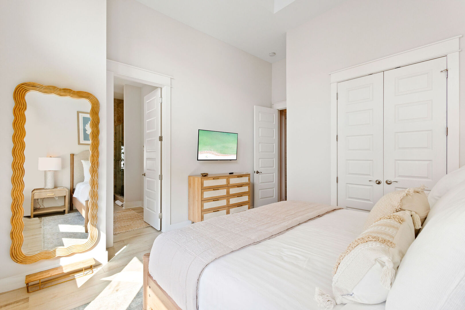 Bedroom features a smart tv.