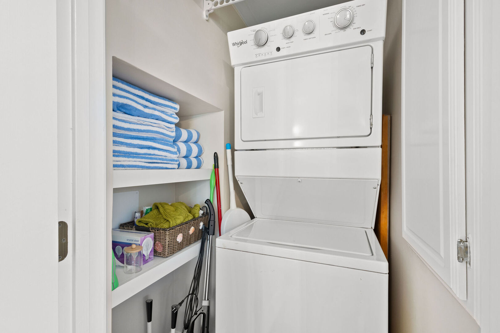 Fist floor features a washer and dryer.