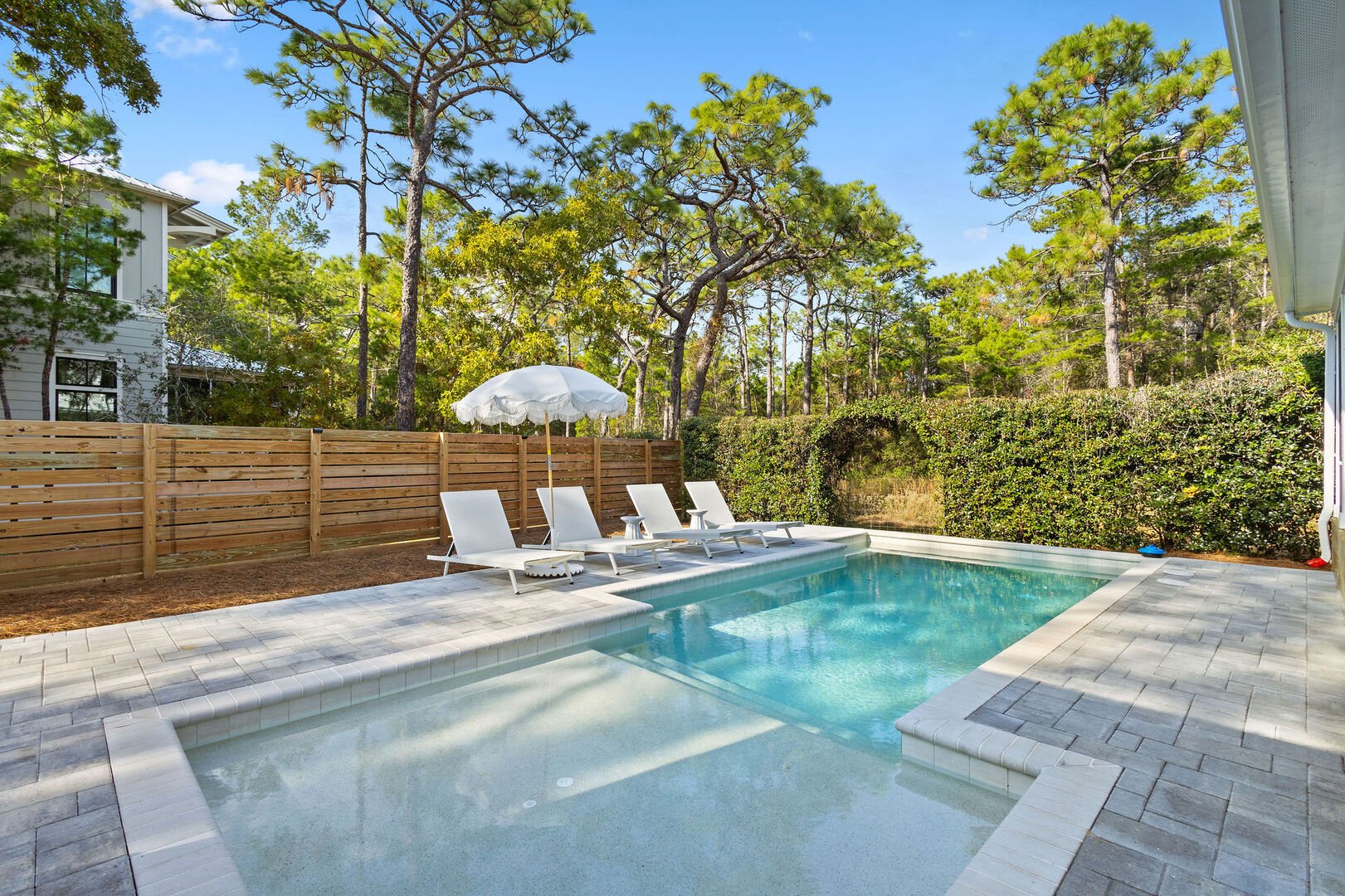 Home features a private fenced in pool with plenty of patio space to bask in the sun!