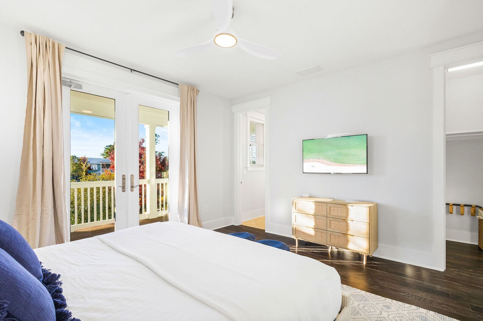 Bedroom #4 features a king bed, smart tv and ensuite. Bedroom features a walkout to balcony.