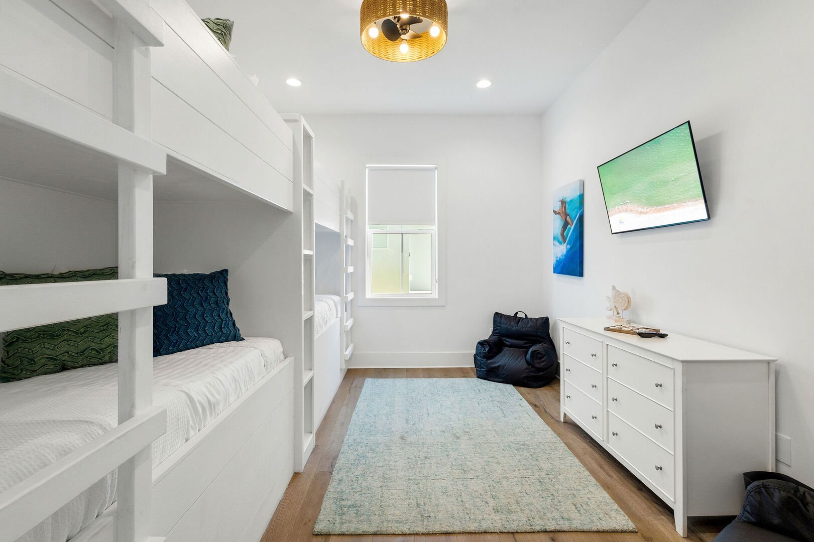 Bedroom features a smart tv.