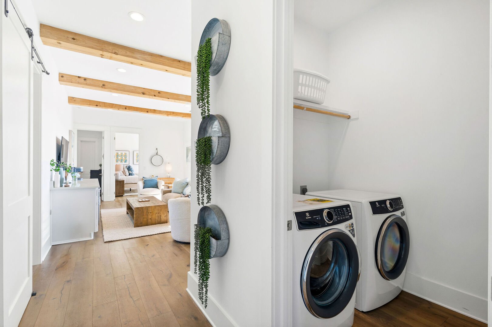 Third floor laundry features a full washer and dryer.