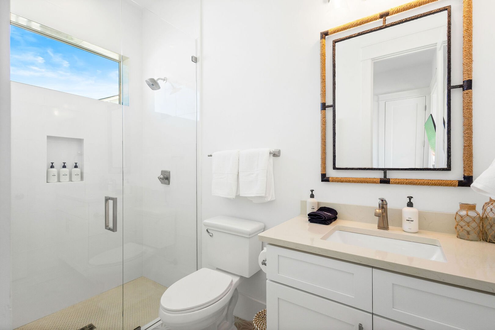 Bathroom features a walk-in shower.
