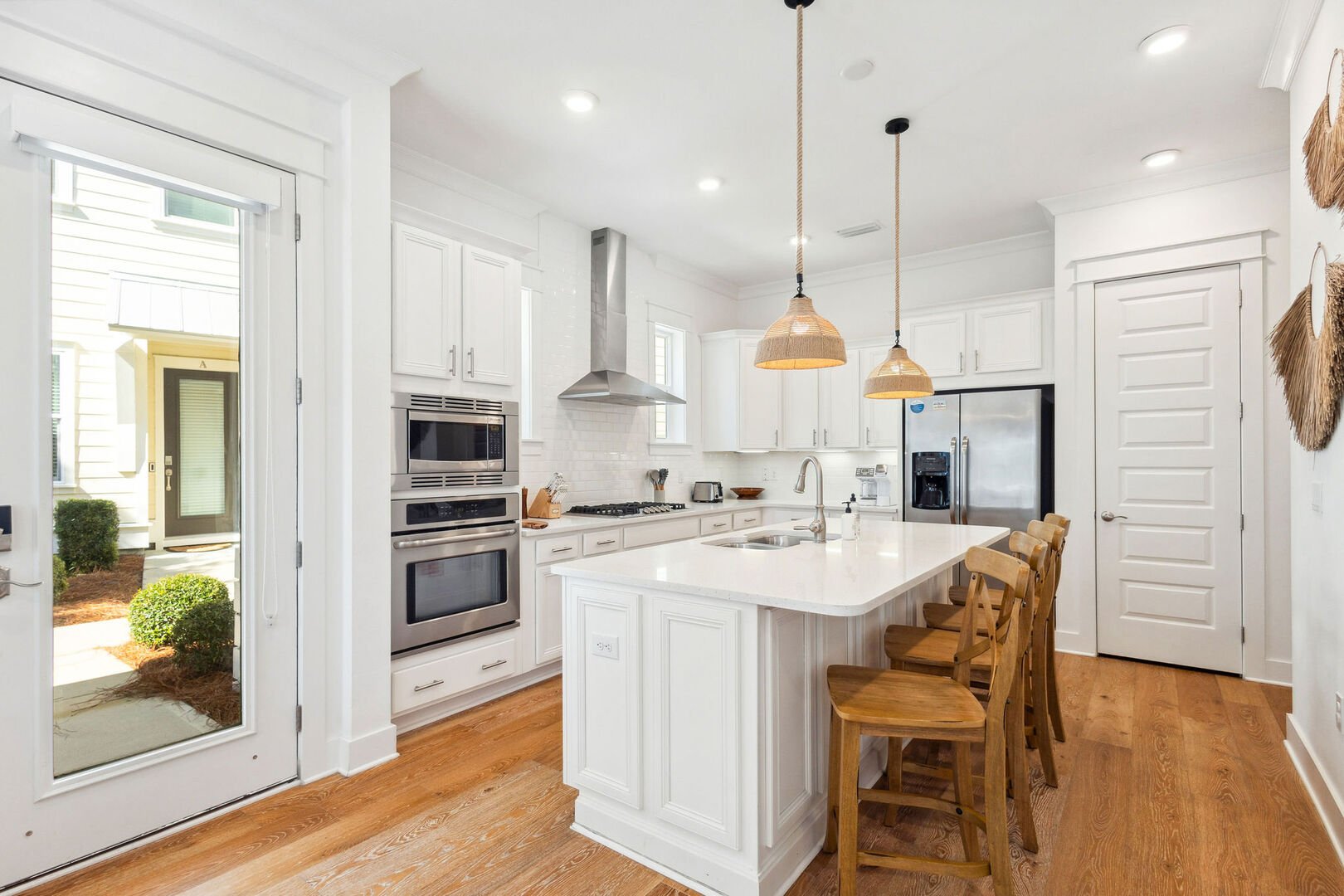 Gourmet kitchen is the perfect spot to gather and cook together as a family. Large kitchen island includes seating for 4!