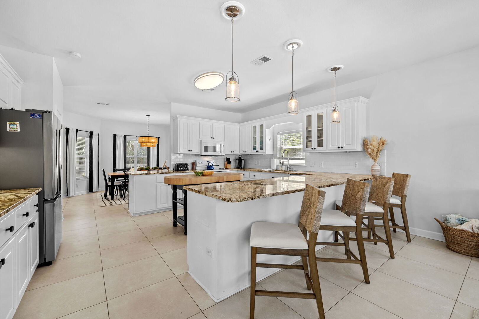 Large kitchen is fully stocked with all your cooking essentials! Perfect for cooking together.