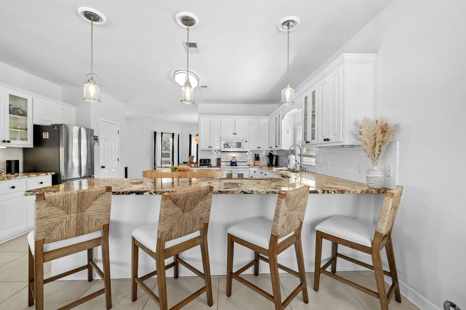 Kitchen island includes seating for 4.