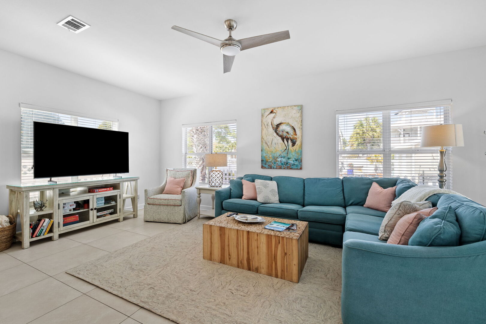 Living room features lonely of seating for all and a smart tv. Perfect place to unwind together in the evenings!