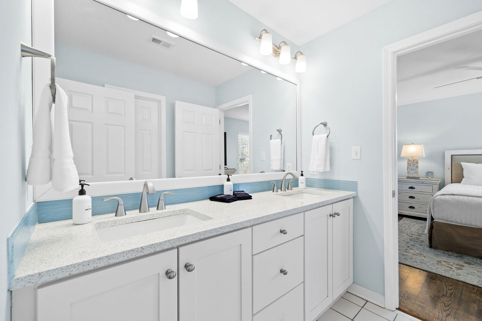 Bedroom #1 and #2 features Jack-n-Jill bathroom that includes dual vanities and a shower/tub combo.