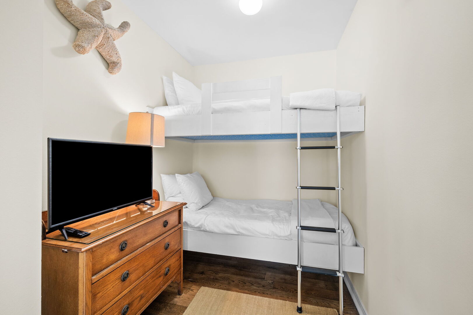 Bedroom #3 also includes (1) twin over twin bunk with a smart tv.