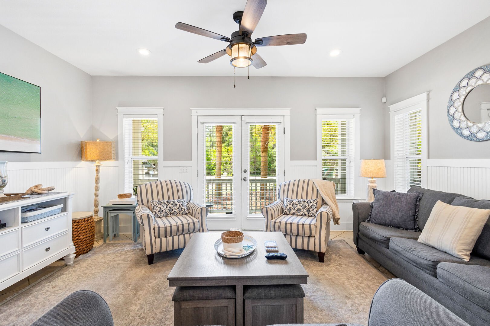 Living room features seating for all and a smart tv. Perfect place to unwind together in the evenings!