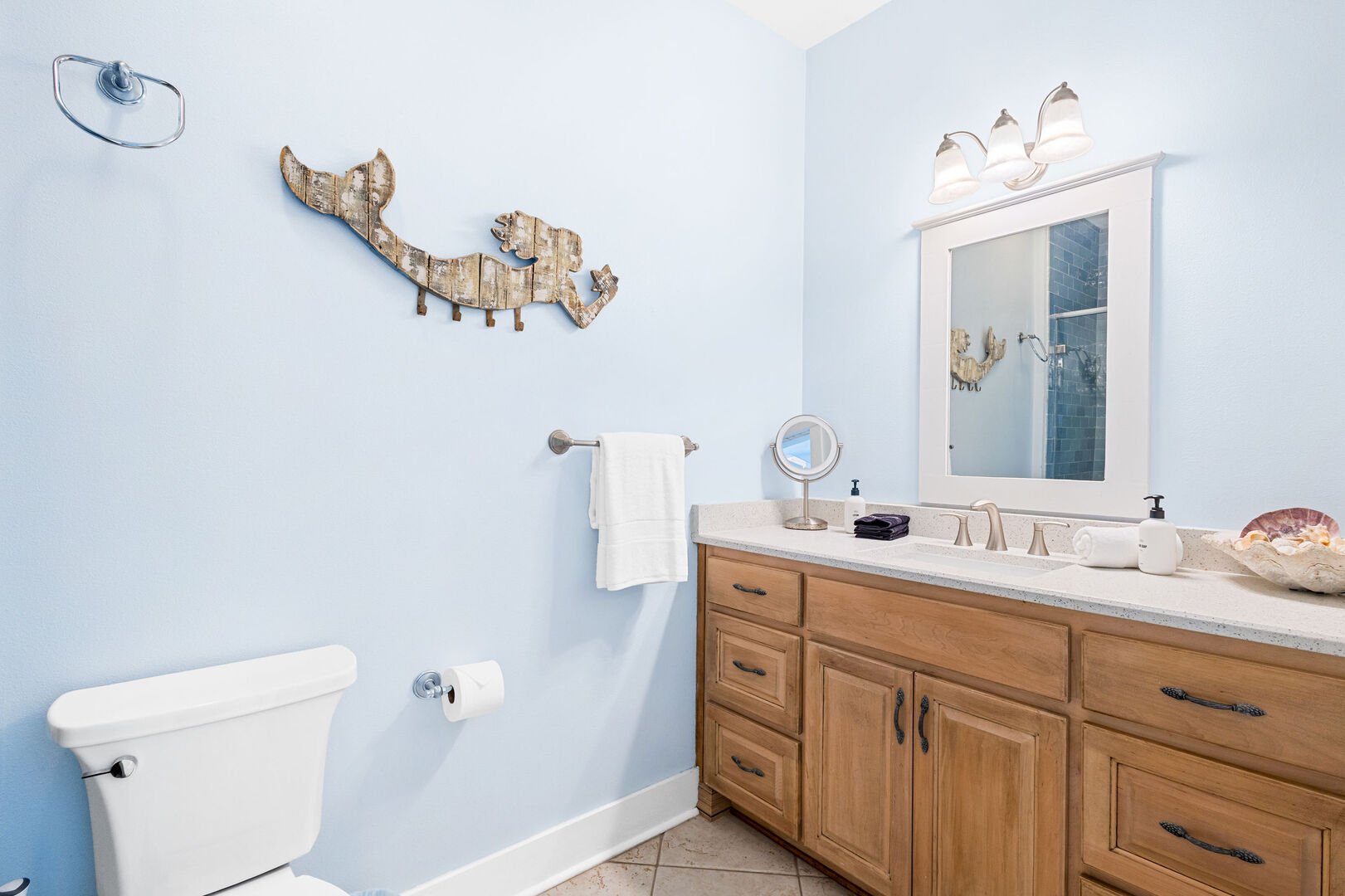 Bathroom features a walk-in shower.