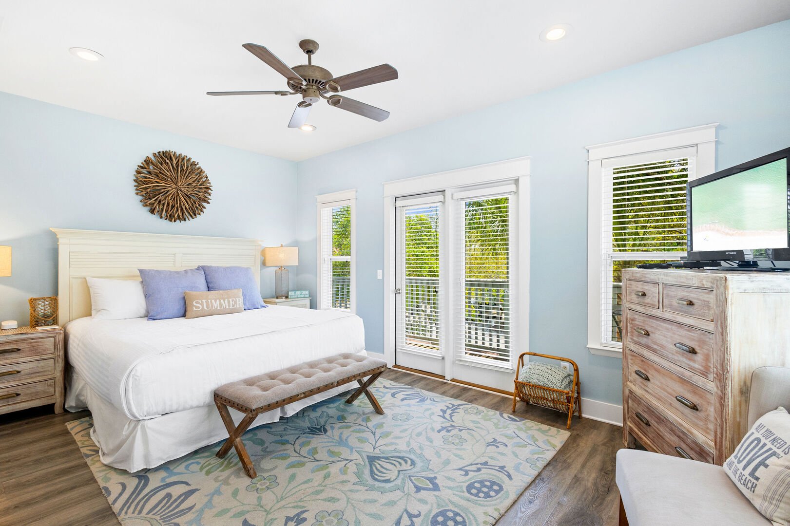 Bedroom features a private balcony.