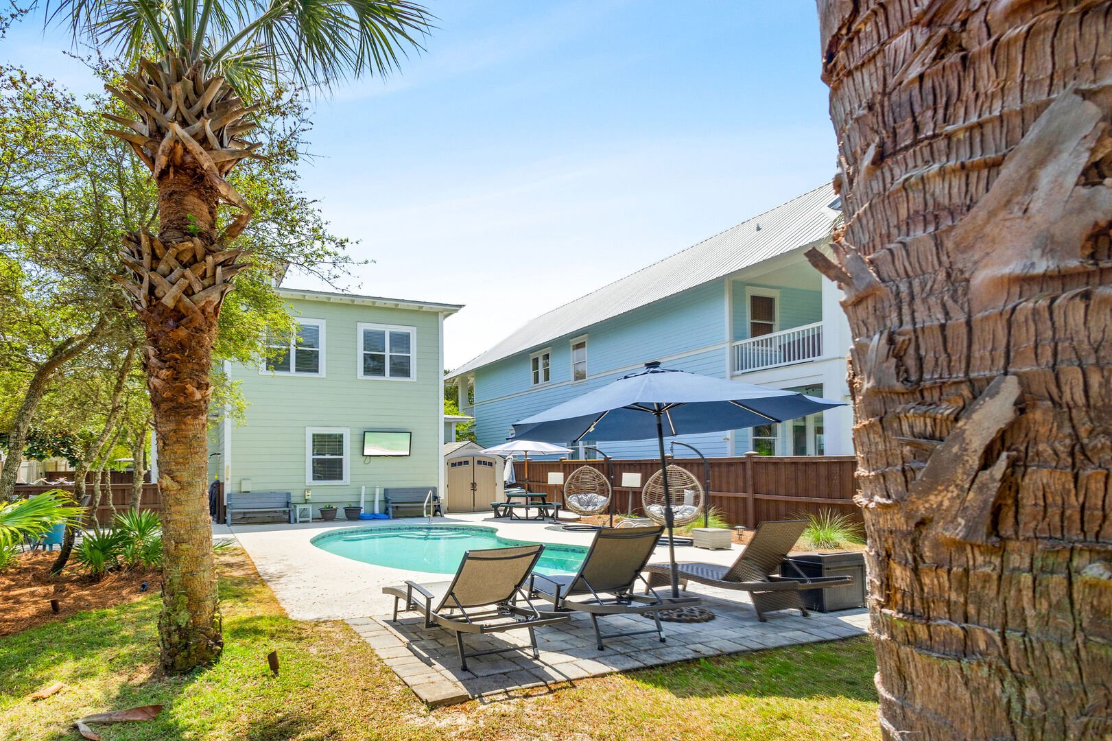 Pool features plenty seating and a smart tv for game days.