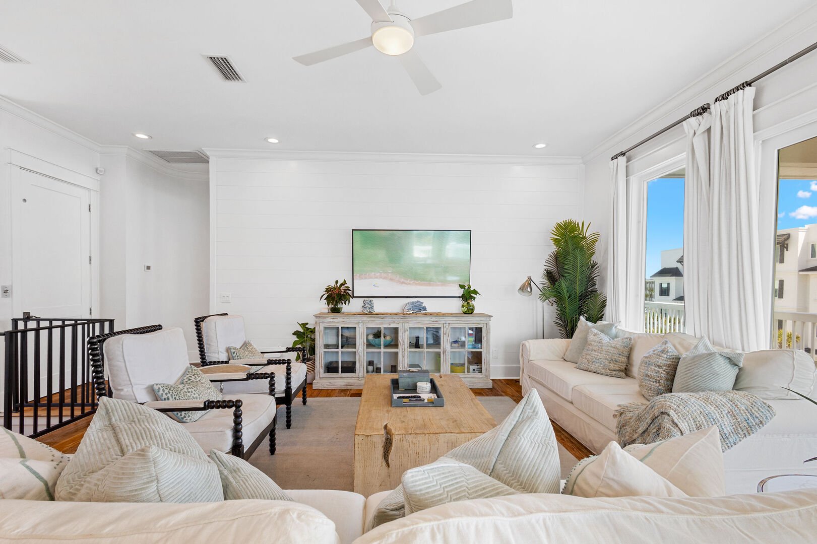Living room features plenty of seating with a smart tv, perfect for entertaining.