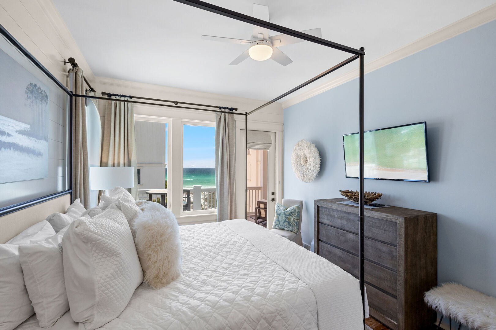 Bedroom includes an irresistible view of the gulf.