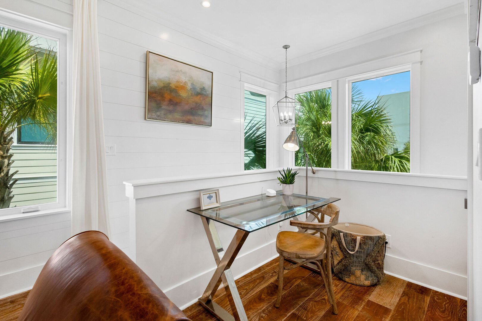 Living area incudes a dedicated workspace.