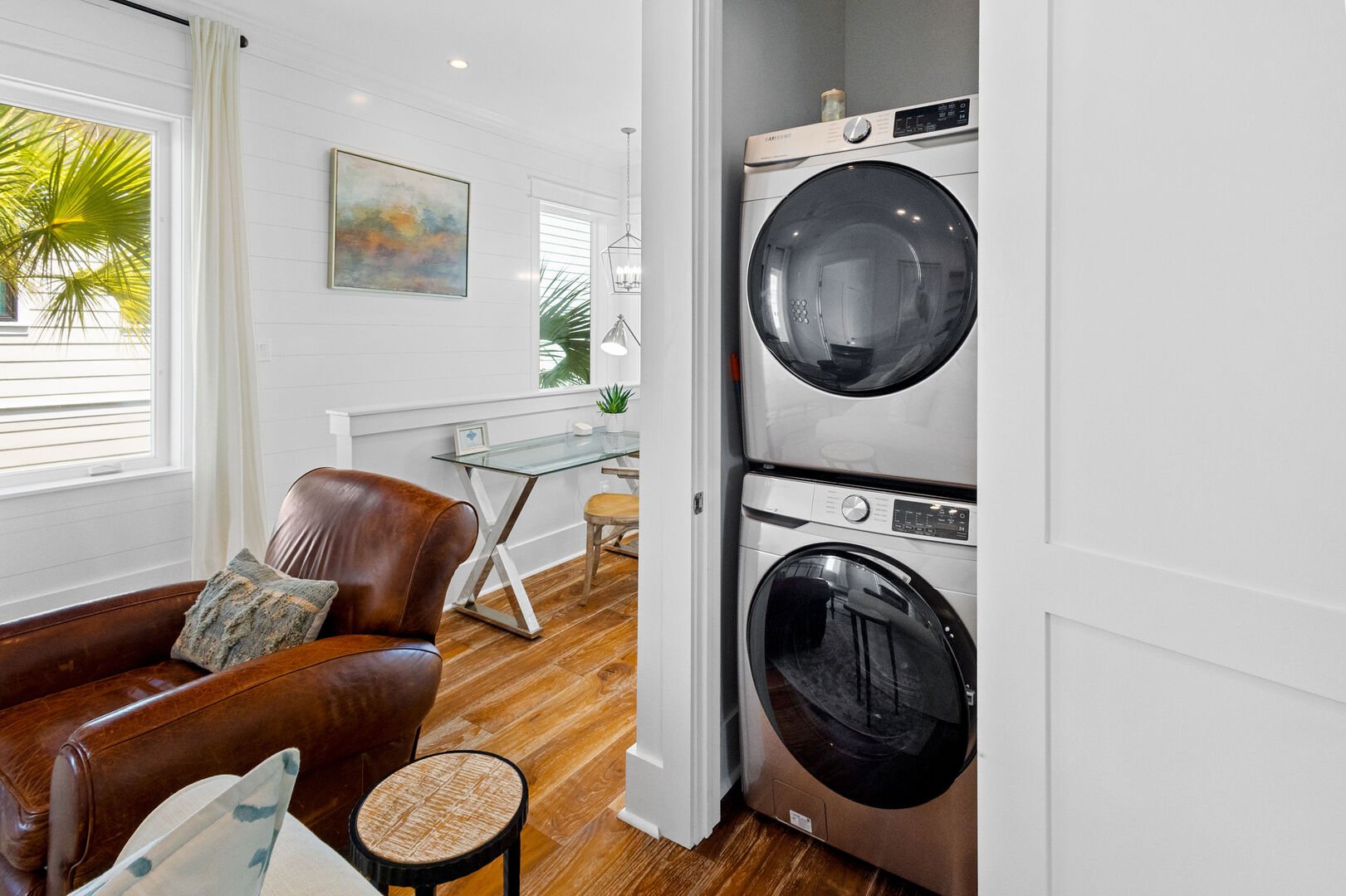 Carriage house features a full washer and dryer.