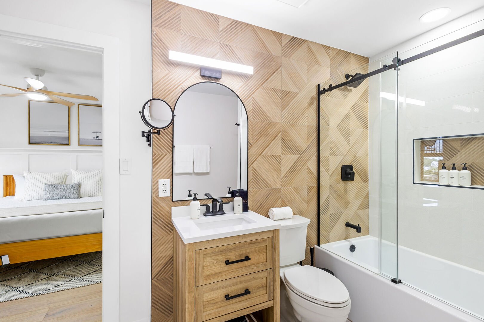 Bathroom features a shower/tub combo.