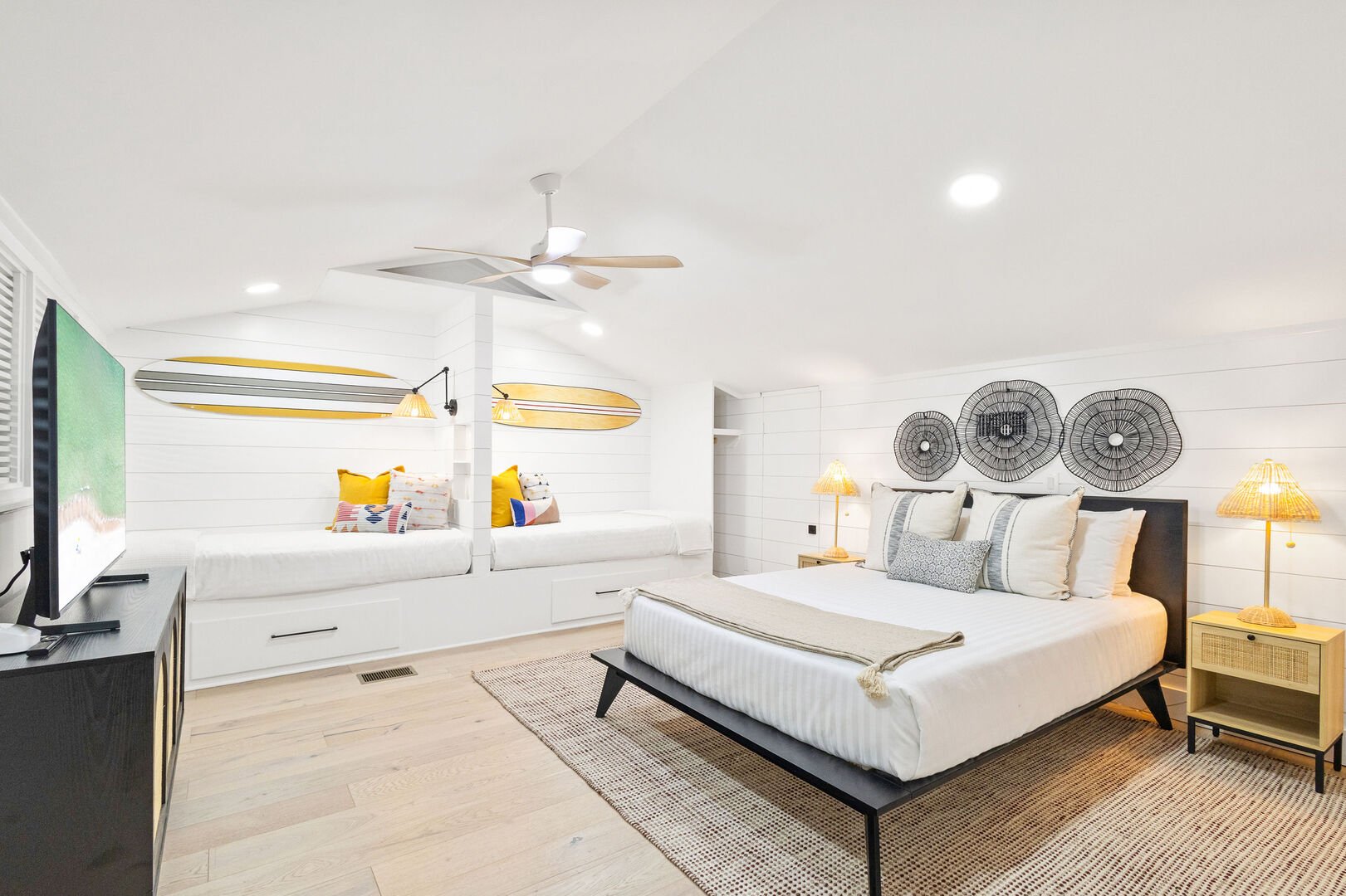 Bedroom #3 features a queen bed, (2) built in twin beds and an ensuite.