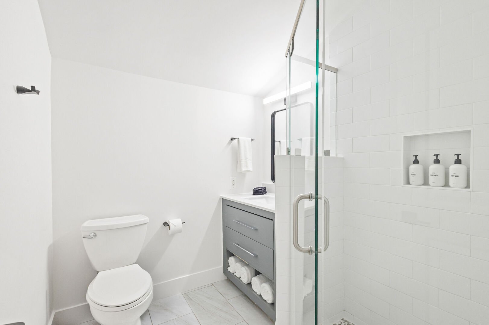 Bathroom features walk-in shower.
