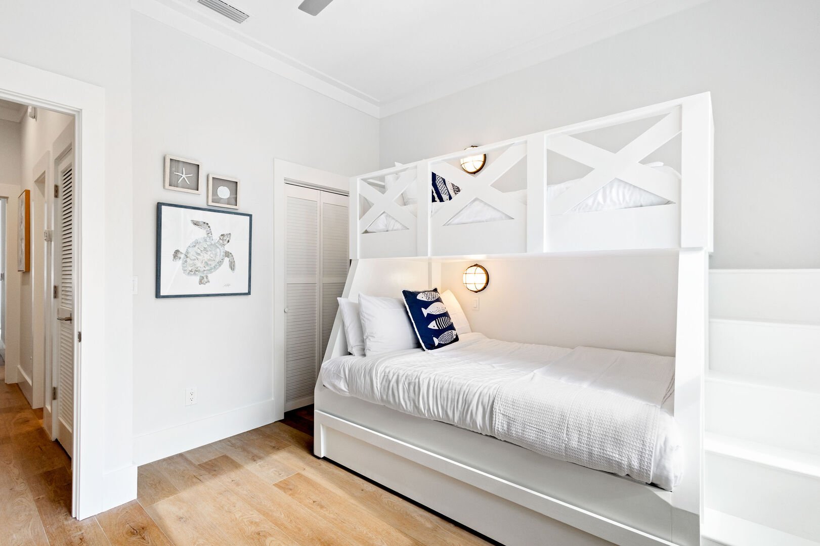 Bedroom #1 features a twin/queen bunk with a twin trundle and a smart tv.