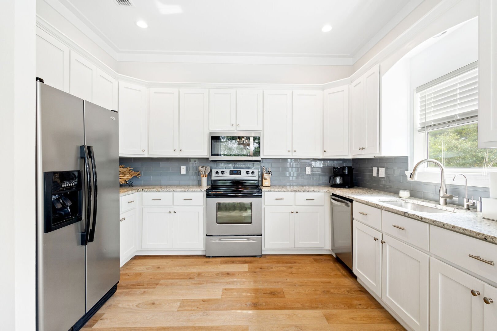 Large fully stocked kitchen is perfect for cooking together.