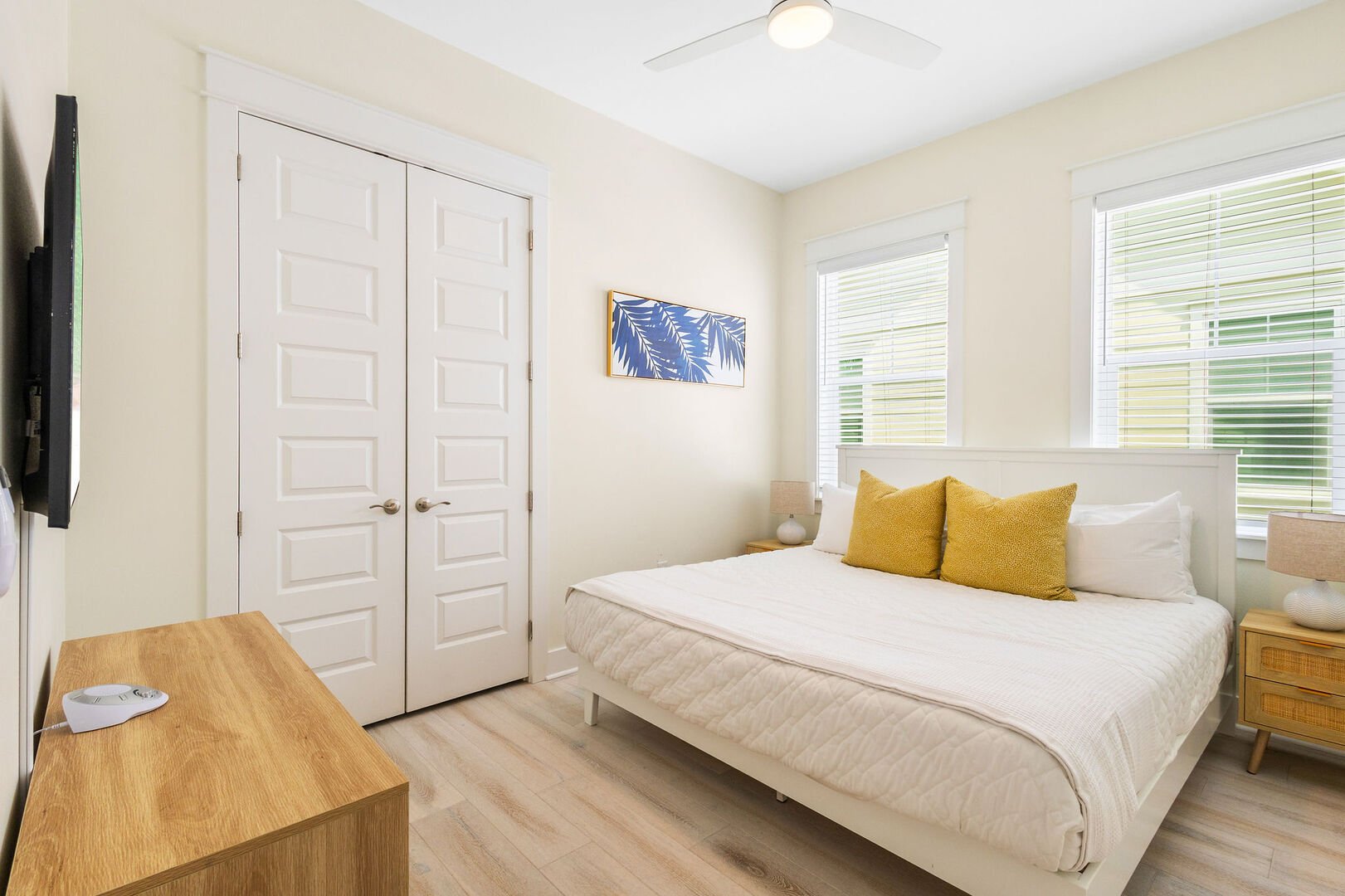 Bedroom #2 features a king bed and smart tv.