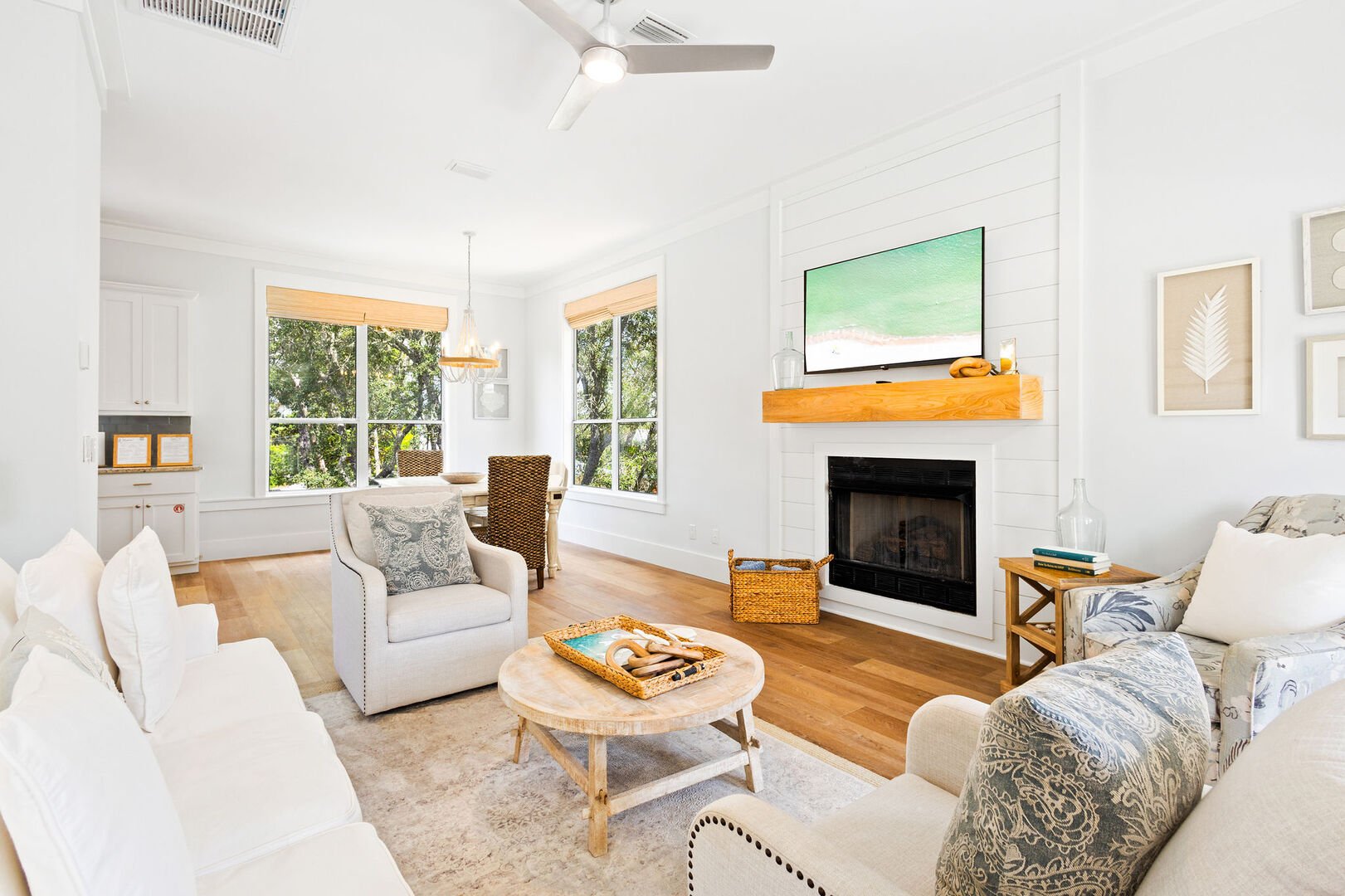 Home features a reverse floor plan, with living, dining, and kitchen on the second floor.