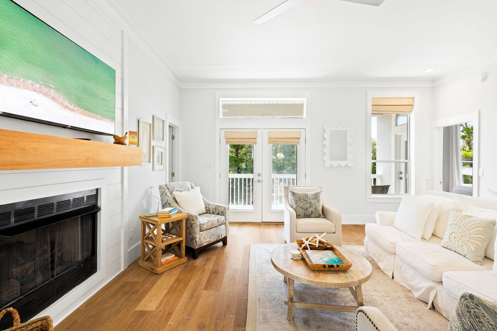 Home features a reverse floor plan, with living, dining, and kitchen on the second floor.