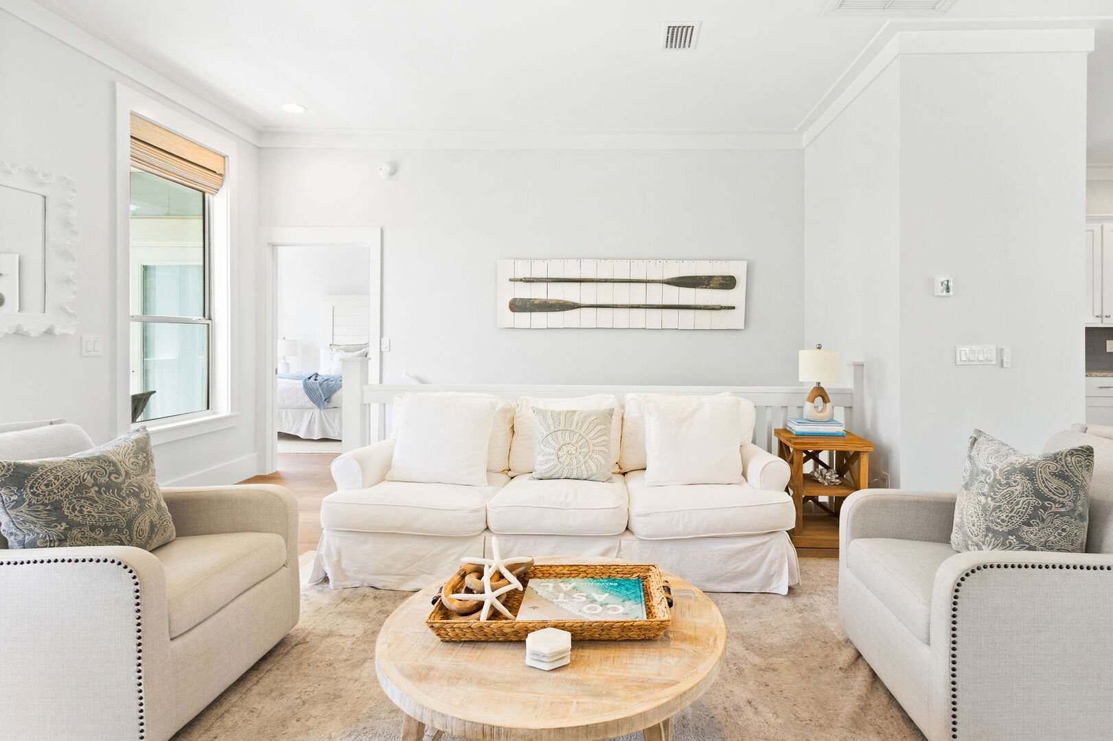 Home features a reverse floor plan, with living, dining, and kitchen on the second floor.