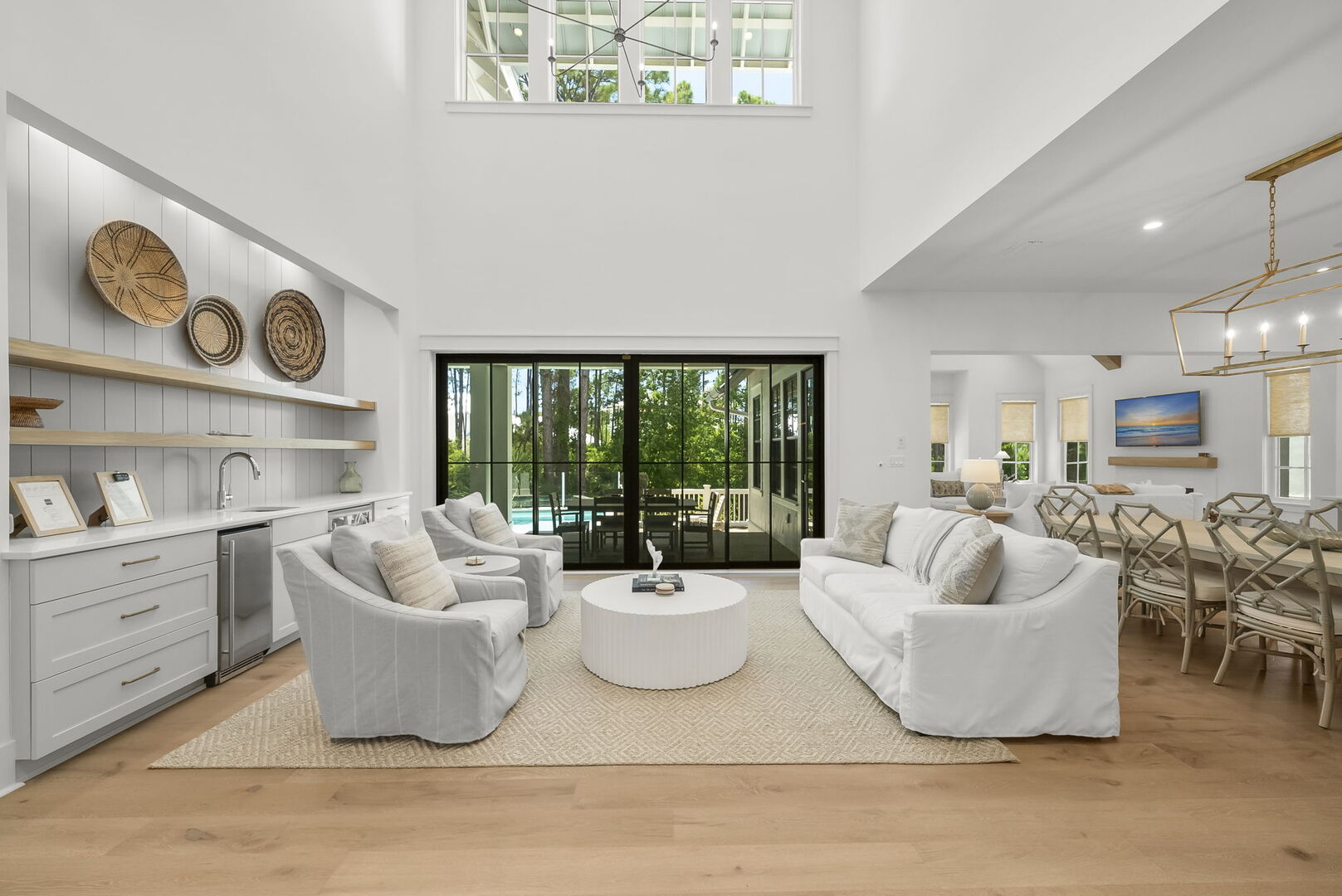 Den features a walkout to the private pool and a wet bar.